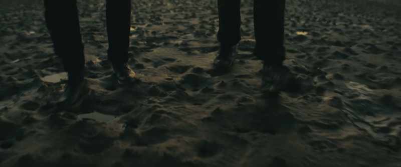 (SQUELCHING FOOTSTEPS)
