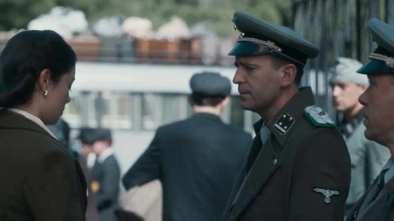 [SS officer speaking German]