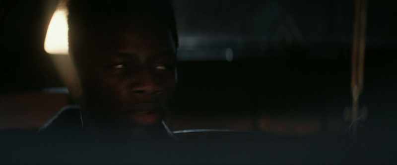 Stay in the car, lock the doors and don't move