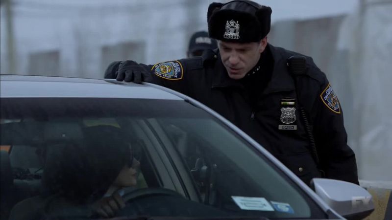 (Stiffly): What's going on, Officer?