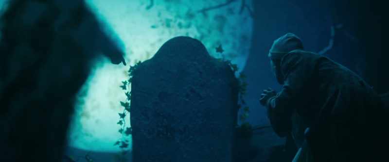 Still the ghost pointed downward to the grave
