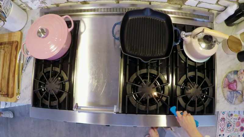 [stove clicking]