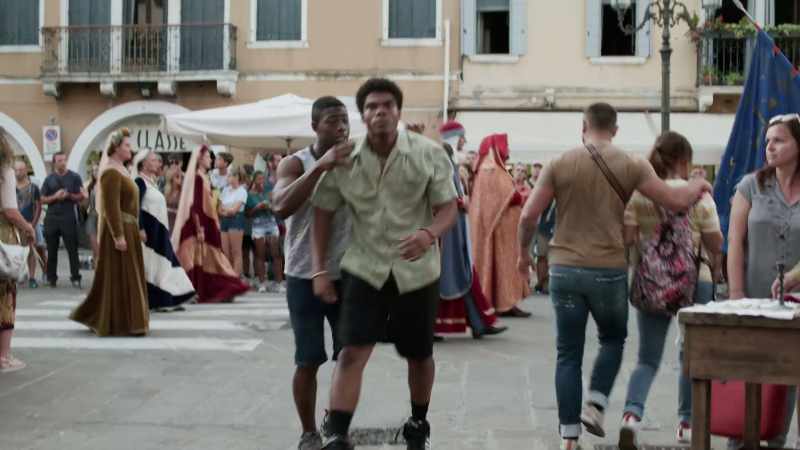 (street chatter, music)