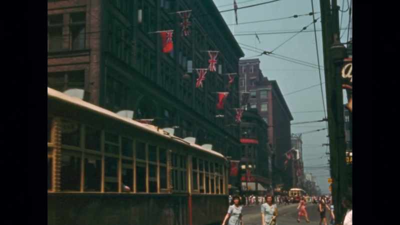(streetcar clanking) - (vehicles honking)