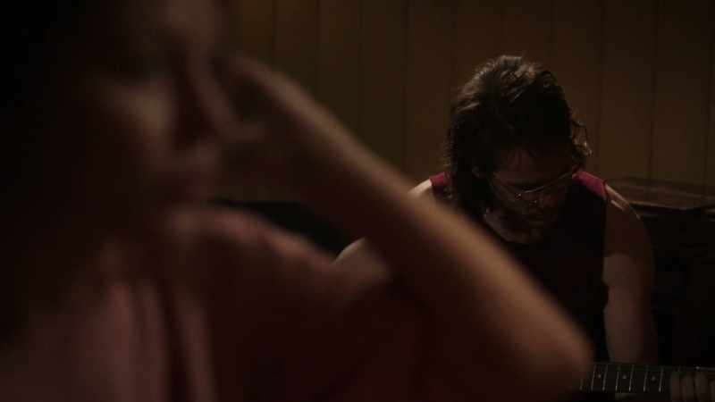 [strumming softly]