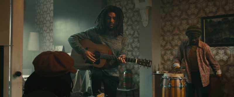 [strums chord]