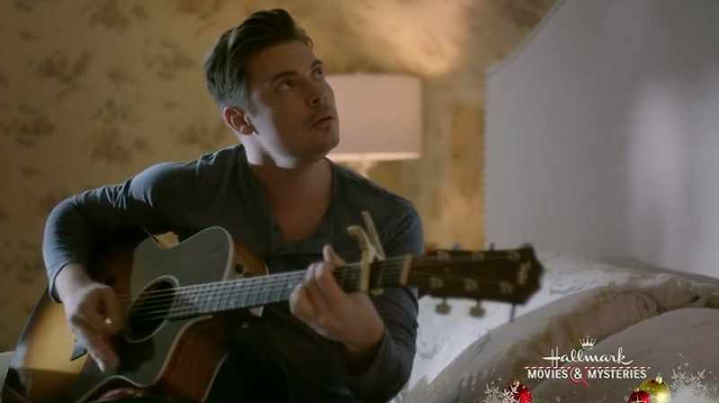 [strums guitar]
