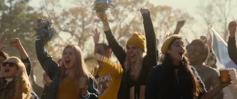 [students cheering]