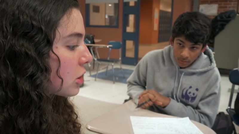 [students talking at once]