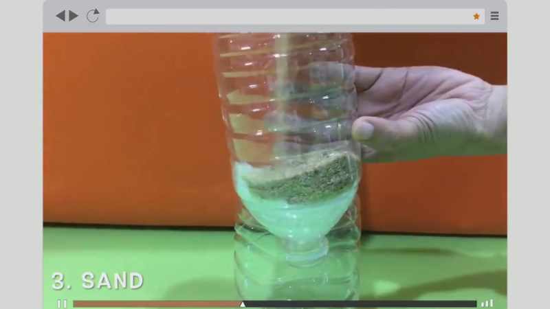 Stuff the base and top it off with a layer of sand