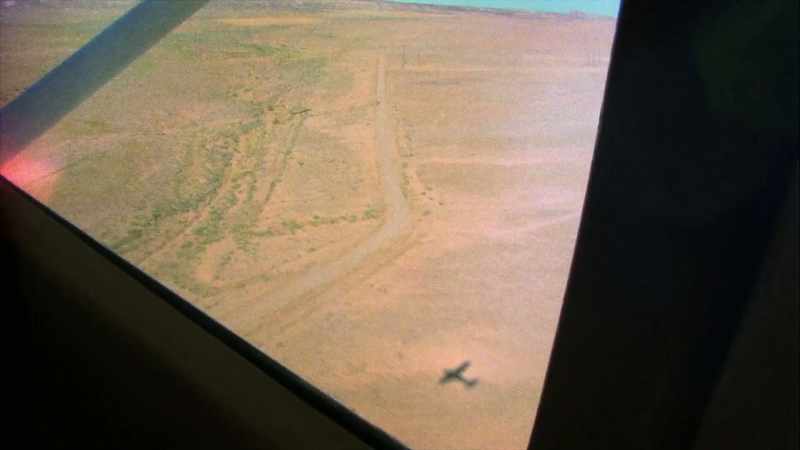 Suddenly he hears a plane coming