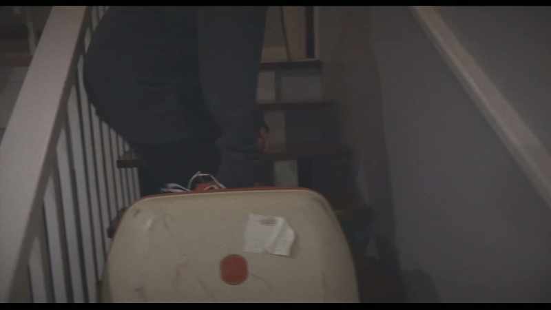 (suitcase clanking)