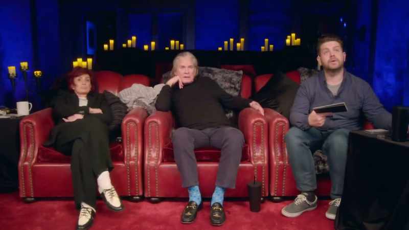 [suspenseful music playing]