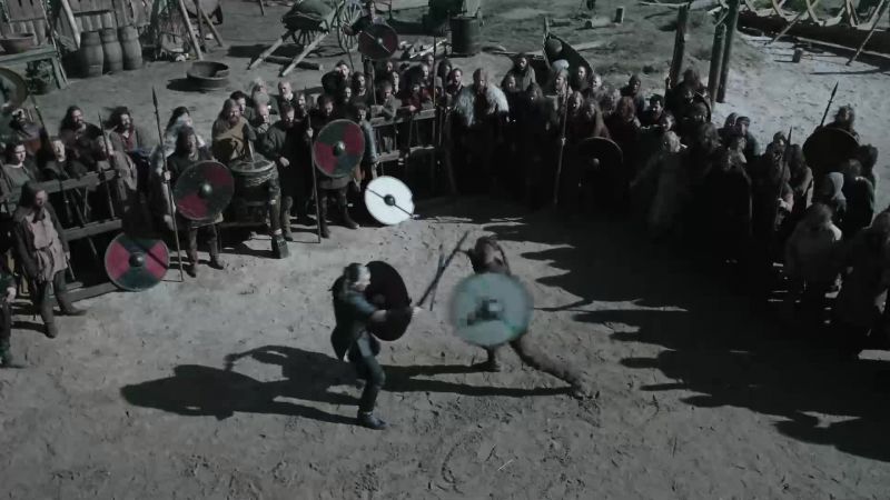 (swords clank, grunts of effort)