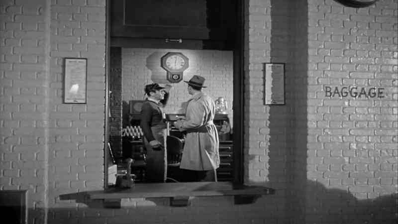 Tall. He had a brown hat and a light coat. - Okay