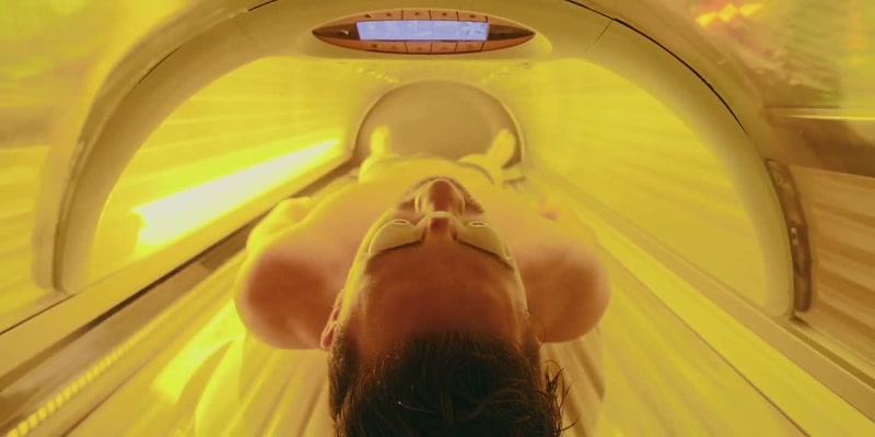 [tanning bed beeps]