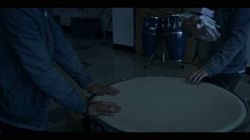 [tapping drum]