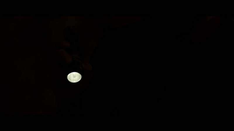 (tapping flashlight)