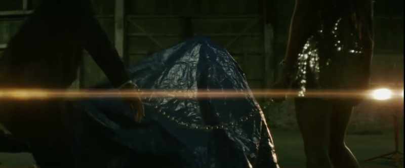 [tarp rustling]