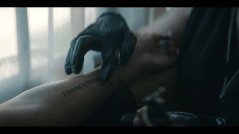 [tattoo needle buzzes]