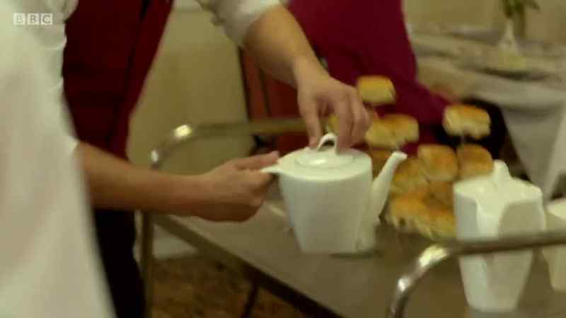 Tea, madam? - Milk first