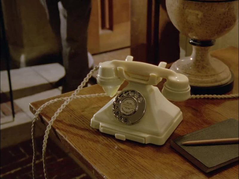 (telephone ringing)