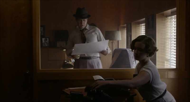 (telephone rings)