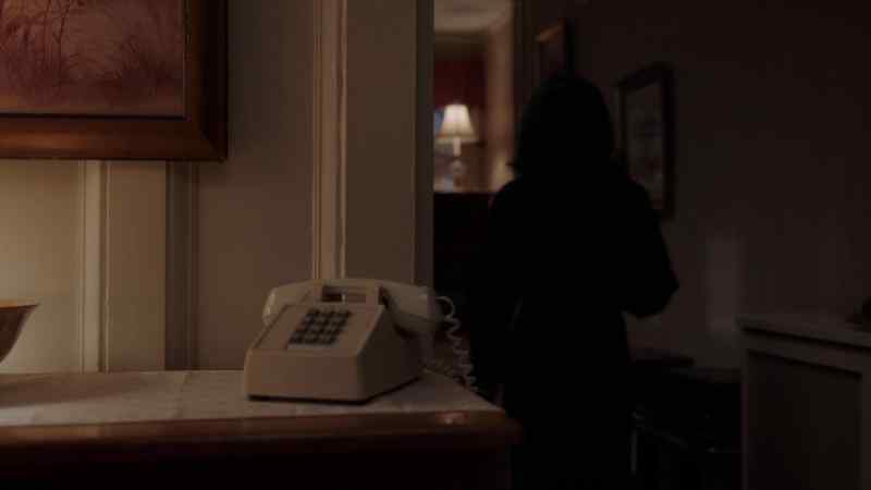 (telephone rings)