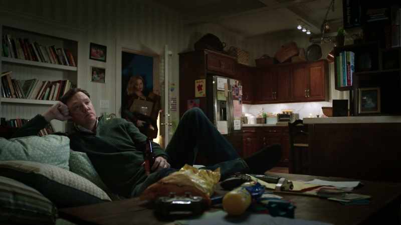 [television playing]