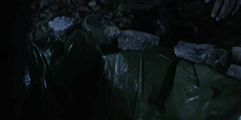 Temperature drops, moisture condenses onto the tarp