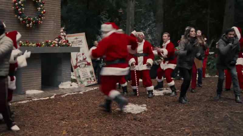 (tense festive music continues)