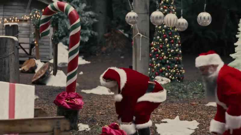 (tense festive music continues)