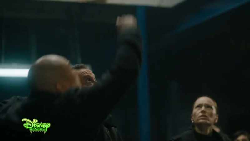 [tense music playing]