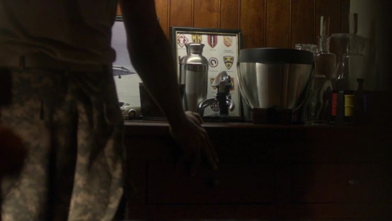 That doesn't look like a man reaching for a drink
