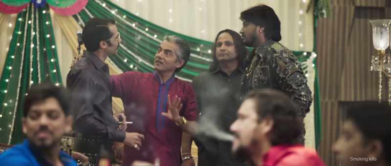 That guy next to Mr. Raza, in the glasses