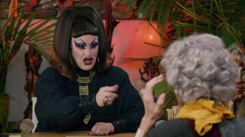 That horrible wig and maybe pull off that hideous outfit and