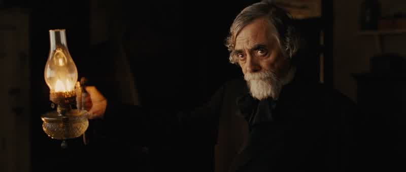 That is my fatherIf you would like to kiss himIt would be all rightHe's gone homePraise the LordWhy is it so muchThe quality of the casketAnd of the embalmingThe life like appearance requires time and