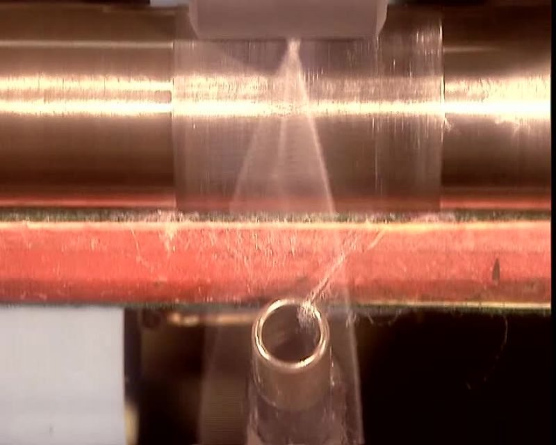 THAT THREAD GOES ONTO SPOOLS