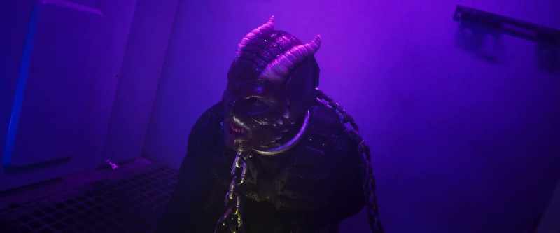 That ugly thing is locked away in a cage where it belongs!