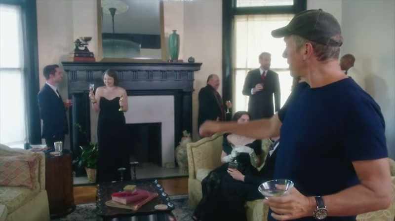 That's her over there by the fireplace