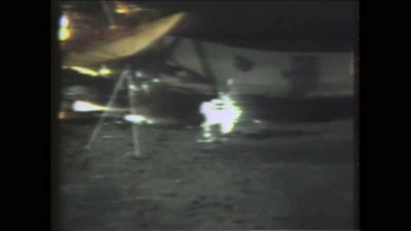 The astronaut does some operations loading with a pulley