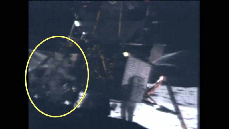 The astronaut on the left leaps forward