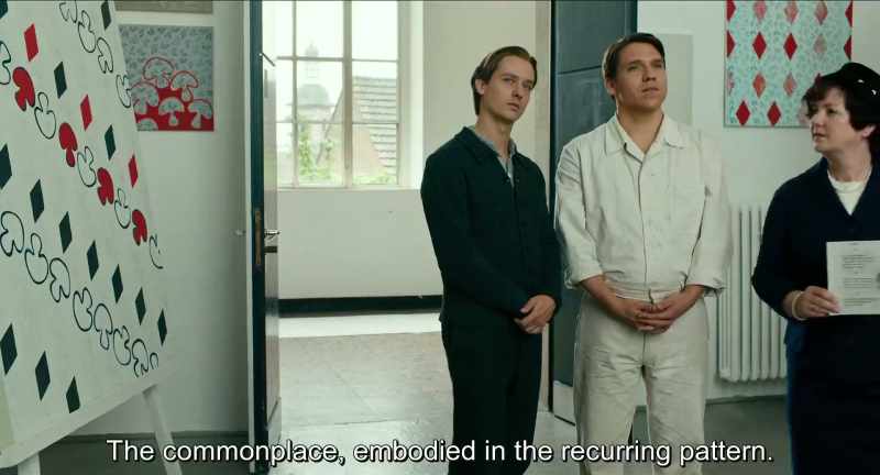 The banality, embodied by the recurring pattern