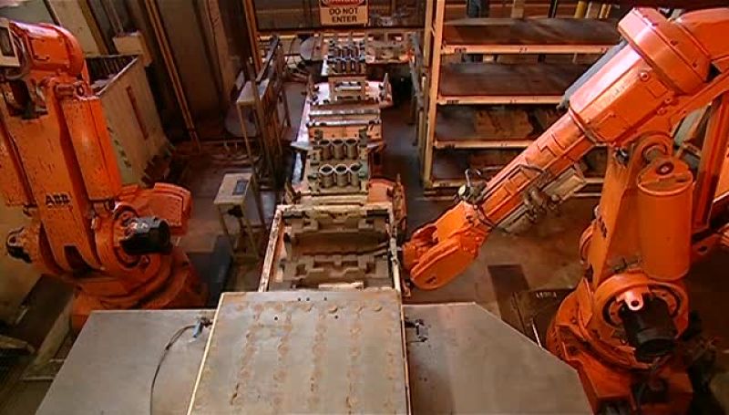 THE BASE CORE TRAVELS DOWN AN ASSEMBLY LINE