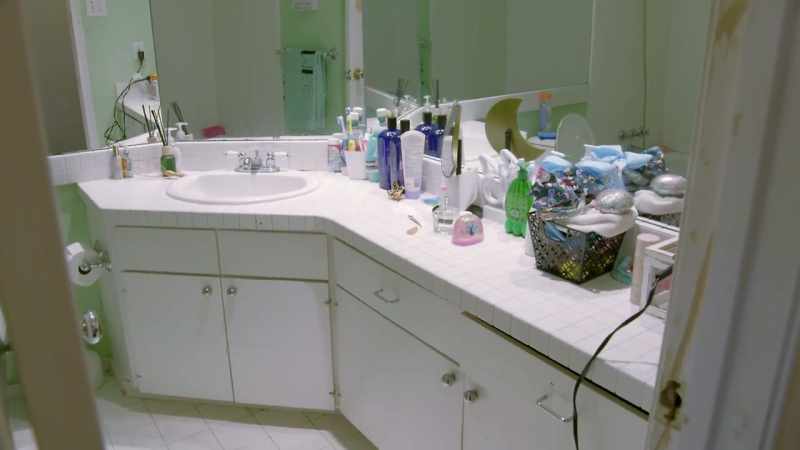 The bathroom is totally dated