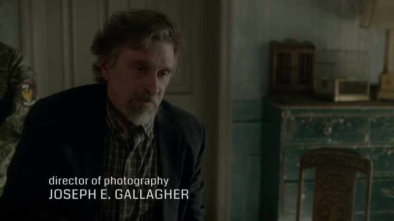 The bloke with the cigar is Philip Bantliff
