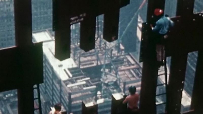 The buildings dwarf you
