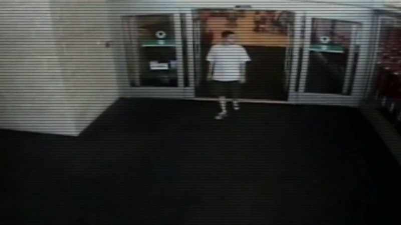 The camera angle is perfect as he's walking out the door