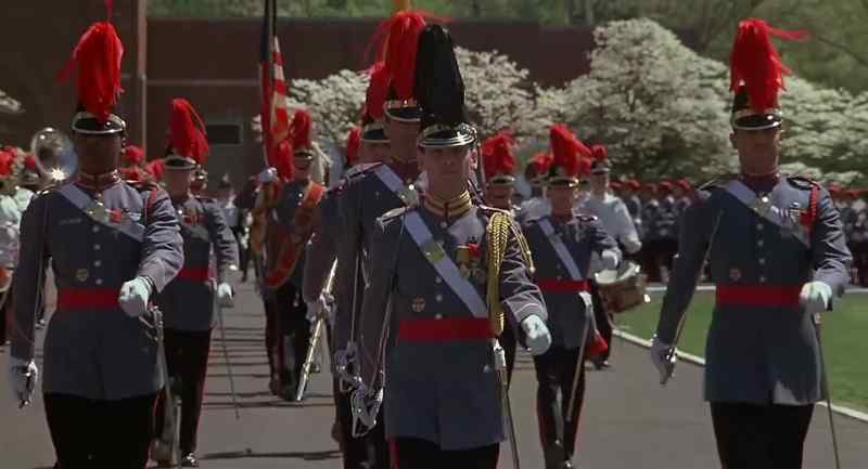 The corps of cadets is commanded by Major John Cooper