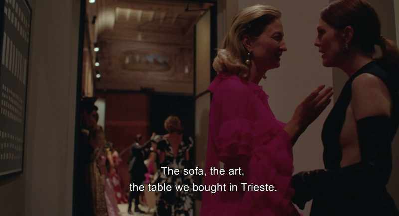 The couch, our paintings, the table from Trieste